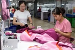 Garments for export to the EU market being produced at TNG Garment Corporation. (Photo: VNA)