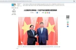 A Xinhua News Agency article reports on the meeting between Chinese President Xi Jinping and Vietnamese Prime Minister Pham Minh Chinh on August 31. (Photo: VNA)