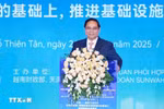 Prime Minister Pham Minh Chinh addresses the Vietnam-China business forum. (Photo: VNA)
