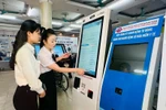 An automated patient registration kiosk at the Quang Ninh provincial General Hospital (Photo: VietnamPlus)