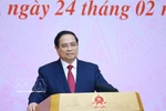 PM Pham Minh Chinh speaks at the meeting (Photo: VNA)