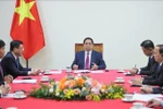 Vietnamese Prime Minister Pham Minh Chinh holds phone talks with his Cambodian counterpart Hun Manet on August 15 afternoon. (Photo: VNA)