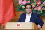 Prime Minister Pham Minh Chinh addresses the 13th meeting of the Central Emulation and Commendation Council on August 8. (Photo: VNA)