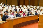 Party General Secretary To Lam (third, left, first row), National Assembly Chairman Tran Thanh Man (fourth, left, first row) and NA deputies attend the ceremony. (Photo: VNA)