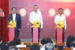 From left: Prime Minister Pham Minh Chinh, Party General Secretary To Lam and permanent member of the Party Central Committee's Secretariat Tran Cam Tu launch three digital platforms which are vital to Resolution 57’s performance. (Photo: VNA)