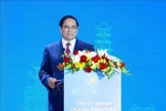 Prime Minister Pham Minh Chinh speaks at the opening ceremony of the 6th ASEAN Digital Ministers' Meeting on January 15. (Photo: VNA)