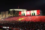 The state-level preliminary review for parade and march for the 80th anniversary of the August Revolution and National Day begins with the flag salute ceremony. (Photo: VNA)