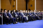 Prime Minister Pham Minh Chinh (2nd from left, front line) at the opening plenary of the World Economic Forum (WEF)’s 16th Annual Meeting of the New Champions, held in Tianjin on June 25. (Photo: VNA)
