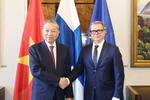 General Secretary of the Communist Party of Vietnam Central Committee To Lam (L) and Finnish Prime Minister Petteri Orpo at their meeting in Helsinki on October 21 afternoon (local time). (Photo: VNA)