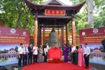 The Hà Nội Handicraft and Village Association officially handed over the restored structure to the Thang Long – Hanoi Heritage Conservation Centre. (Photo: cand.com.vn) 
