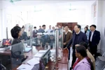 Secretary of the Party Committee of Lai Chau province Le Minh Ngan inspects two-tier local administration model (Photo: VNA)