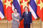 National Assembly Chairman Tran Thanh Man (R) welcomes Thai Prime Minister Paetongtarn Shinawatra in Hanoi on May 15. (Photo: VNA)