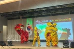 A lion dance performance by the Hwaseong Lion Dance troupe at the programme. (Photo: VNA)