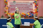 A team introduces themselves and the reason for participating in the contest in Vietnamese. (Photo: VNA)