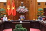 Prime Minister Pham Minh Chinh chairs a meeting of the Government’s standing members on October 21. (Photo: VNA)