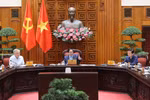 Prime Minister Pham Minh Chinh chairs a meeting of the Government’s standing members on October 21. (Photo: VNA)
