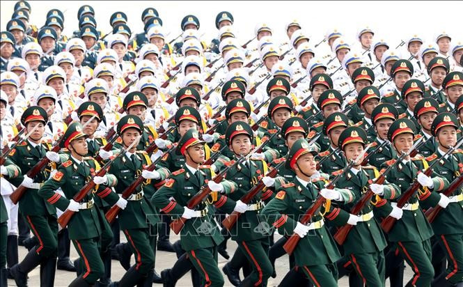 Soldiers representing the infantry, navy, and air defence forces of the Vietnam People's Army in a parade (Photo: VNA)