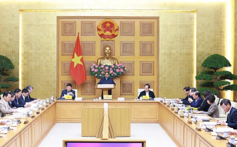 PM Pham Minh Chinh chairs the meeting in Hanoi on December 29. (Photo: VNA)