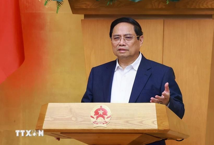 PM Pham Minh Chinh addresses the Government's regular meeting on June 4. (Photo: VNA)