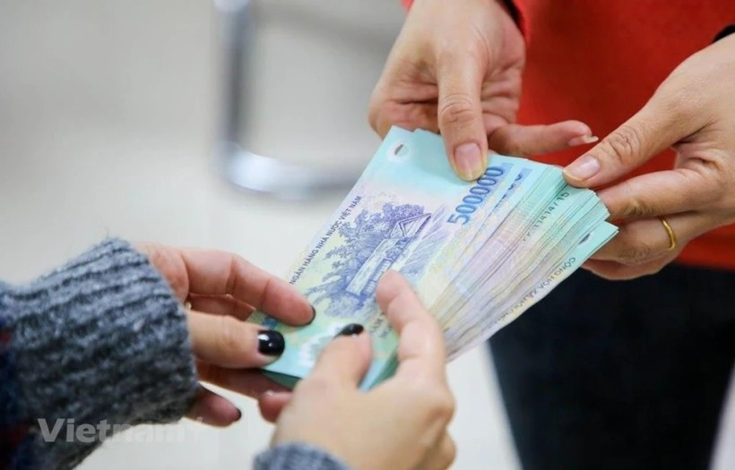 The daily reference exchange is set at 25,119 VND/USD on July 9. (Photo: VNA) 