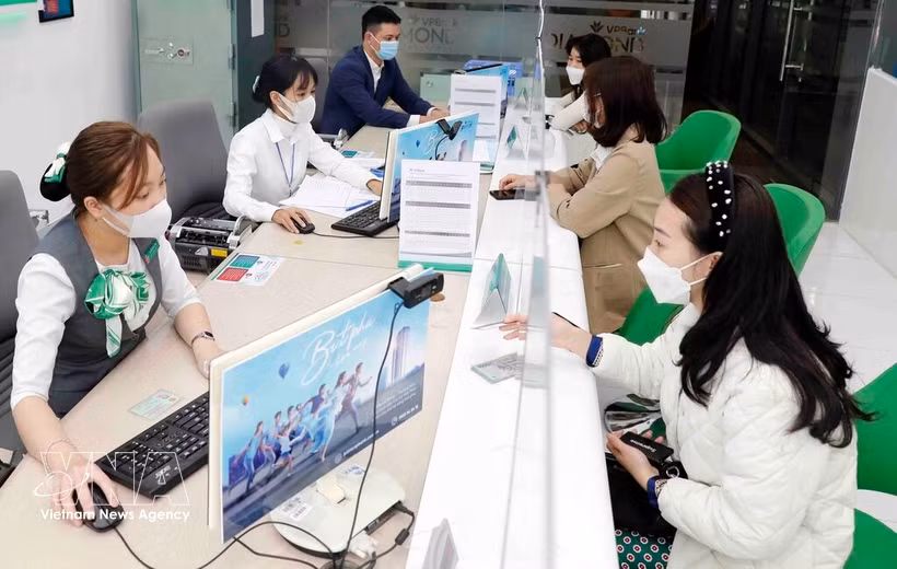 Banks remain the economy’s primary funding artery just as the battle for deposits intensifies. (Photo: VNA)