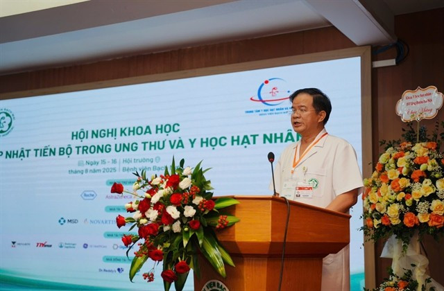 Director of Bach Mai Hospital Dao Xuan Co speaks at the symposium on August 16. (Photo: VNS/VNA)