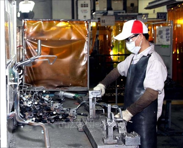 Machinery components are produced at Vietnam Precision Industrial No. 1 Co Ltd in Khai Quang Industrial Park, Vinh Phuc province. (Photo: VNA)