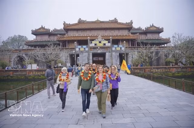 Foreigners visit Hue Imperial Citadel. The ancient capital is reshaping its tourism landscape by mapping out four distinctive zones. (Photo: VNA)