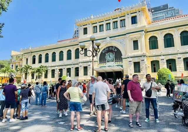 International visitors at the renowned HCM City Central Post Office in downtown District 1. (Photo: VNA)