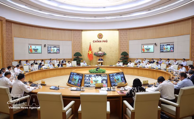 The Government’s regular meeting for March and the Government-to-locality teleconference on April 4 (Photo: VNA)