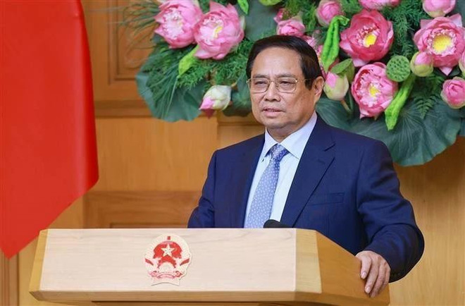 Prime Minister Pham Minh Chinh speaks at the dialogue with the US business community in Hanoi on May 13. (Photo: VNA) pham-minh-chinh-3089.jpg