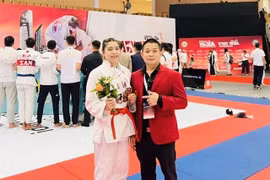 Nguyen Thi Minh Vuong (left) will represent Vietnam in the women's 57kg category in the World Games 2025's jujitsu. (Photo: Vietnam Sports Team)