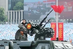 Army vehicles and artillery on parade for 80th National Day