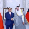PM holds talks with Kuwaiti counterpart 