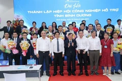 Participants in the congress held on June 19 to establish the Binh Duong Association of Supporting Industries (BASI). (Photo: VNA)