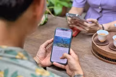 The survey found that mobile phones, particularly smartphones, have become an essential part of daily life in Vietnam. (Photo: VietnamPlus)