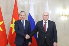 Party General Secretary To Lam (left) meets with Russian Prime Minister Mikhail Mishustin in Moscow on May 8. (Photo: VNA)