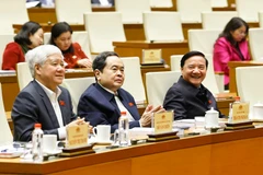 NA Chairman Tran Thanh Man (centre) and Vice Chairmen Do Van Chien (left) and Nguyen Khac Dinh at the conference on January 13 (Photo: VNA)