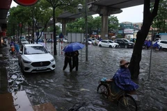 Cau Dien street in Hanoi is flooded on October 7 morning due to heavy rains overnight. (Photo: VNA)