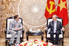 General Secretary of the Communist Party of Vietnam Central Committee To Lam (right) receives Scott Strazik, President and CEO of GE Vernova, in Hanoi on March 9, 2026. (Photo: VNA)