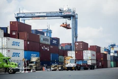 Containers of goods are handled at Cat Lai Port, Ho Chi Minh City. (Photo: VNA)