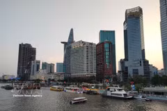 Tourists can experience city views from the Saigon River on boats. (Photo: VNA)