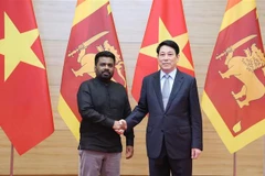 Vietnamese President Luong Cuong and his Sri Lankan counterpart Anura Kumara Dissanayaka at the banquet held in honour of the latter in Hanoi on May 5. (Photo: VNA)