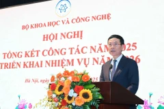 Minister of Science and Technology Nguyen Manh Hung addresses the conference in Hanoi on December 26. (Photo: VNA)