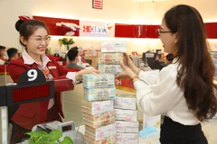 As of June 30 this year, Vietcombank, MB, VPBank, and HDBank had a total outstanding loan of nearly 3.8 quadrillion VND. (Phôt: VNA) 