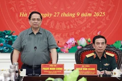 Prime Minister Pham Minh Chinh speaks at the meeting with the Central Military Commission and the Ministry of National Defence on September 27. (Photo: VNA)