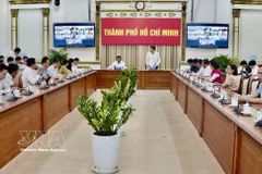 The working session between the Ho Chi Minh City People’s Committee and relevant departments, agencies and localities on February 28 (Photo: VNA)