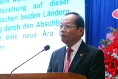 Chairman of the Vietnam – Germany Friendship Association in Da Nang Nguyen Huu Lai speaks at the event. (Photo: VNA)