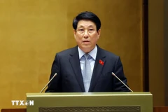 President Luong Cuong delivers a report on the State leader's performance during the 2021–2026 term at the 15th National Assembly’s 10th session on October 20. (Photo: VNA)