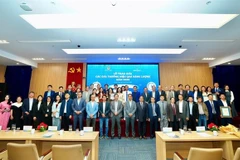 Individuals and organisations honoured with the 2025 Energy Efficiency Awards in Industry and Construction. (Photo: bnews.vn)